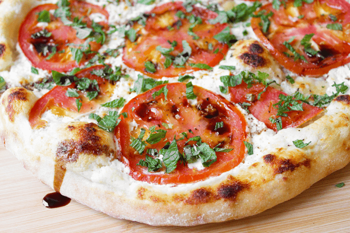 goat cheese pizza finished side view