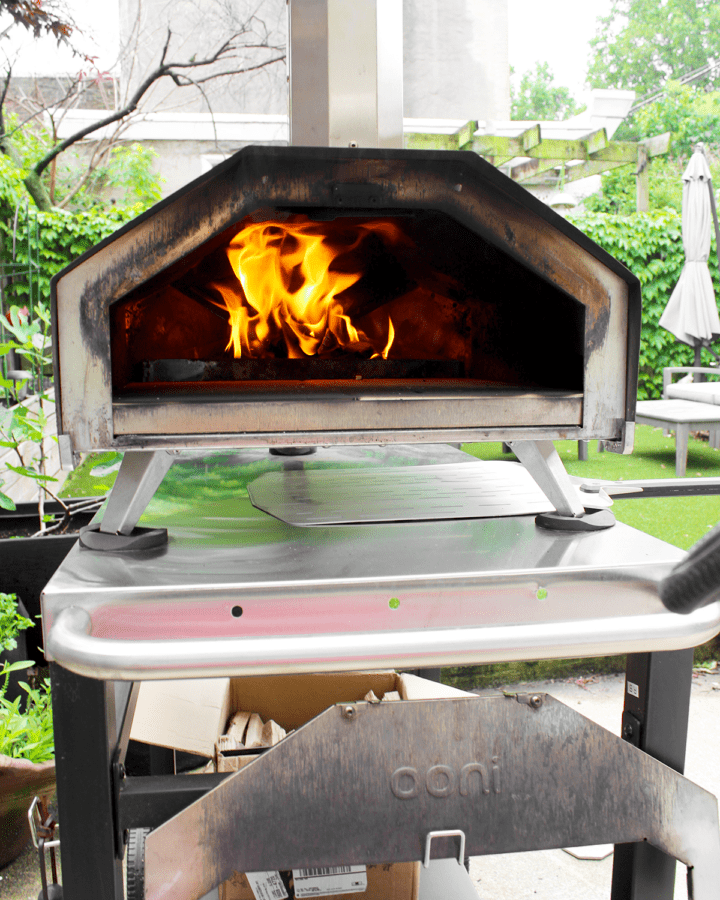ooni pizza oven with fire lit
