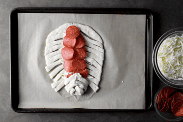 wrapping dough for mummy pizza braids