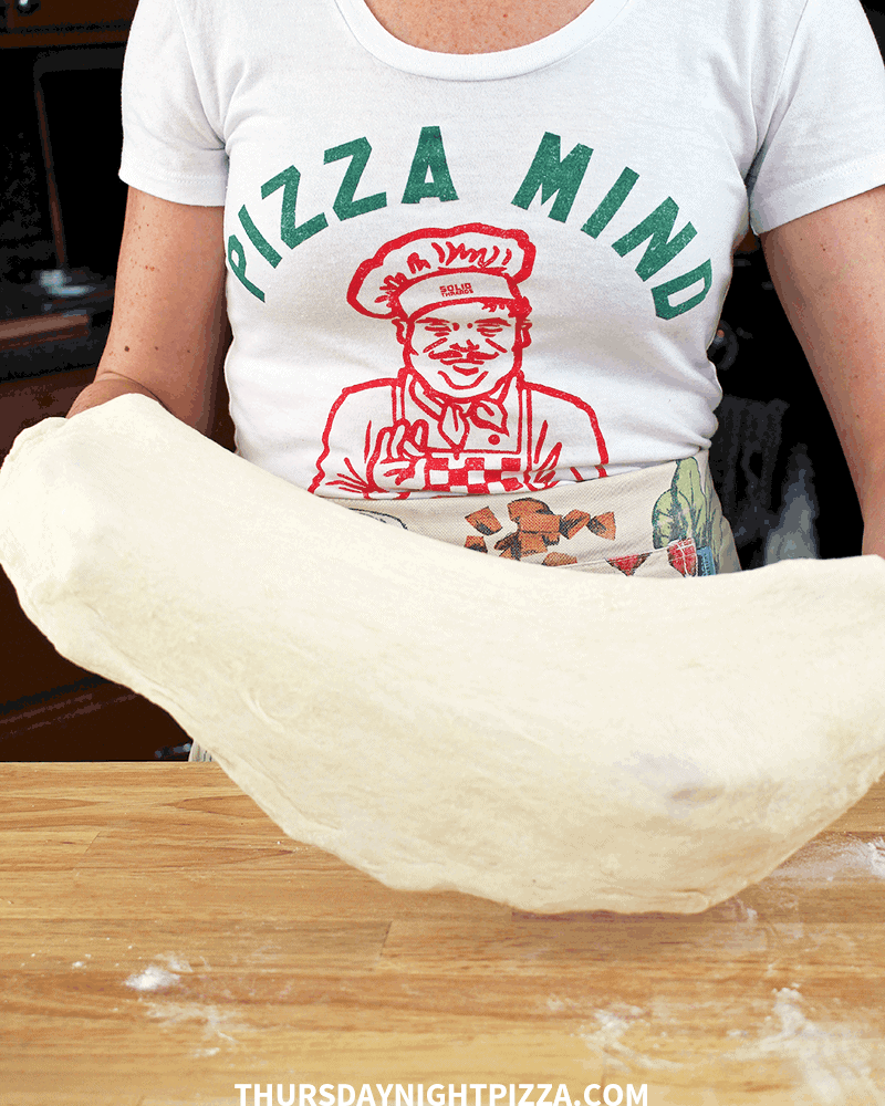 stretching out Sourdough Pizza Dough